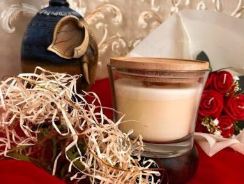 Hand-poured white scented candle in clear glass jar, luxury home décor candle with Buddha statue and red roses